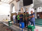 Wujud Kepedulian Sosial, Masjid Al Qohhar Bersama Polsek Metro Penjaringan Bagikan 500 Paket Sembako untuk Ojol