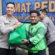 Kapolres Metro Jakarta Utara Gelar Jumat Peduli, Puluhan Paket Sembako Dibagikan untuk Pengemudi Ojol