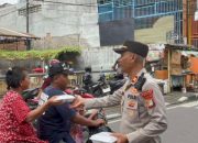Polsek Koja Gelar Jumat Peduli, Bagikan Makanan Bergizi Gratis untuk Warga